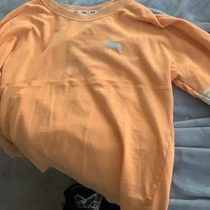 pink crewneck sweater